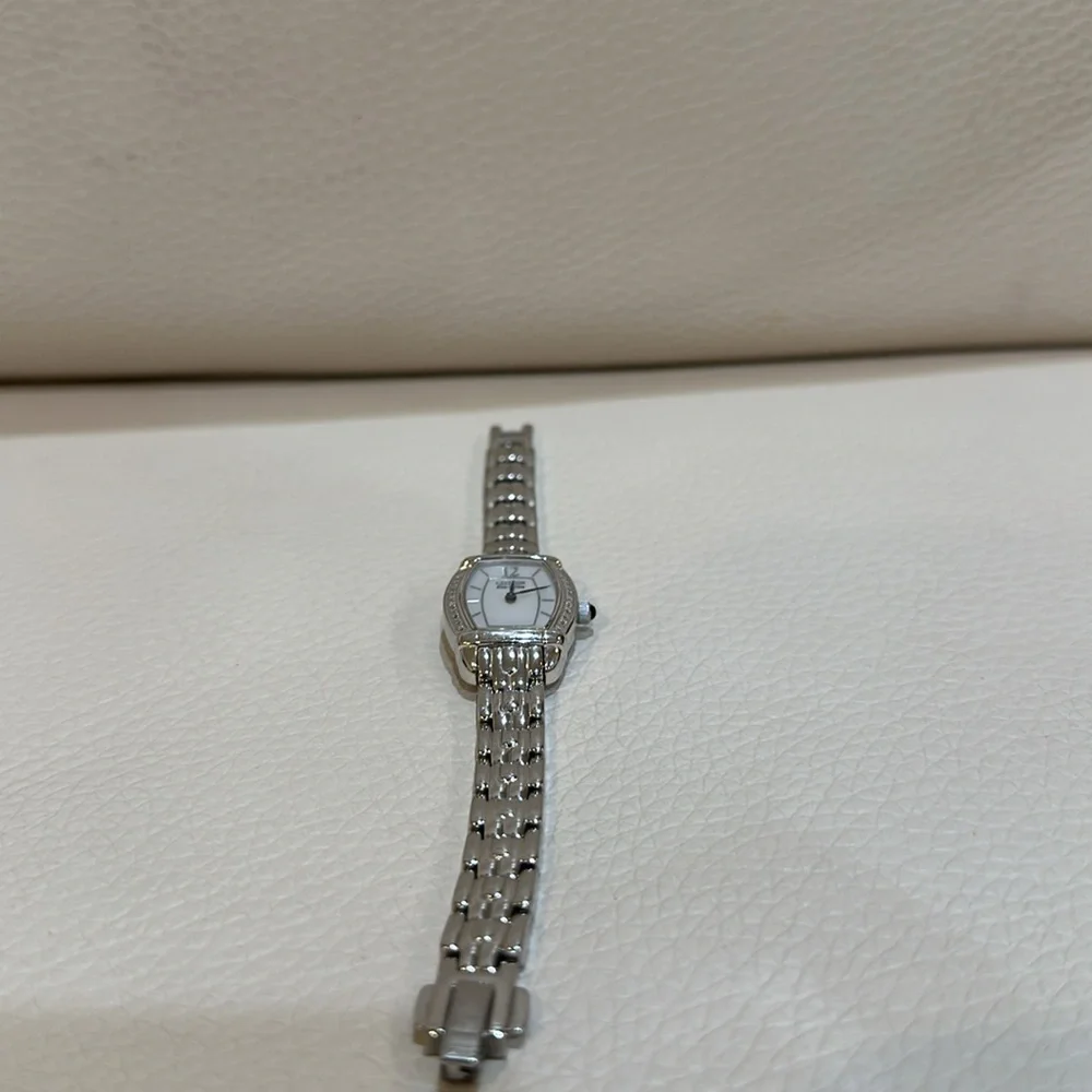 Citizen Women’s Natural Diamond Rectangle Wristwatch Model code: EW5413-50A